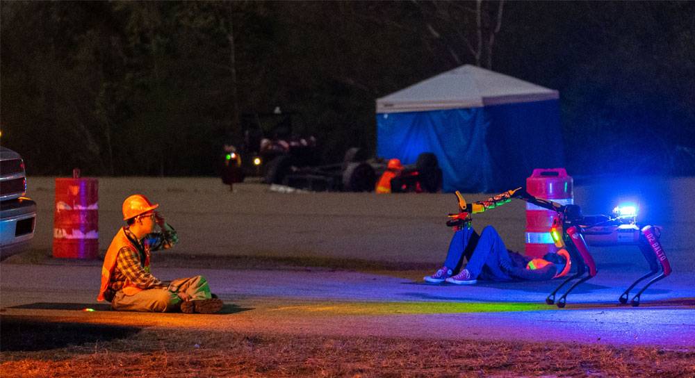 Download high-resolution image Uncrewed ground vehicle assesses injuries of simulated casualty, night course, DARPA Triage Challenge Workshop 2
